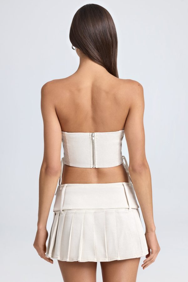 Belted Pleated Low-Rise Micro Mini Skirt in Ecru - Image 2